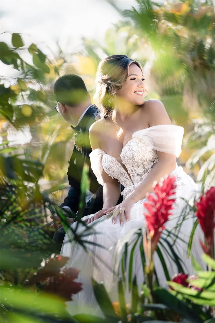 Smiling bride captured by Cancun wedding photographer.