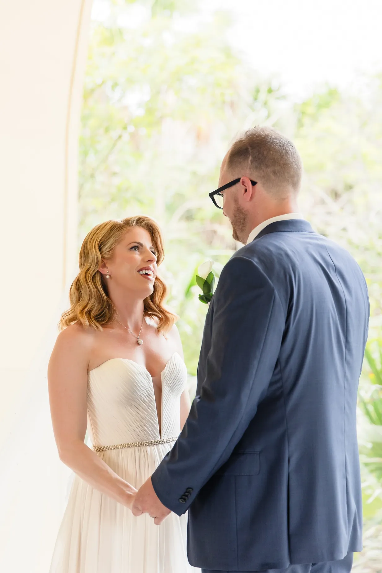 Bride and groom at their destination wedding ceremony at hotel Xcaret Arte in Mexico