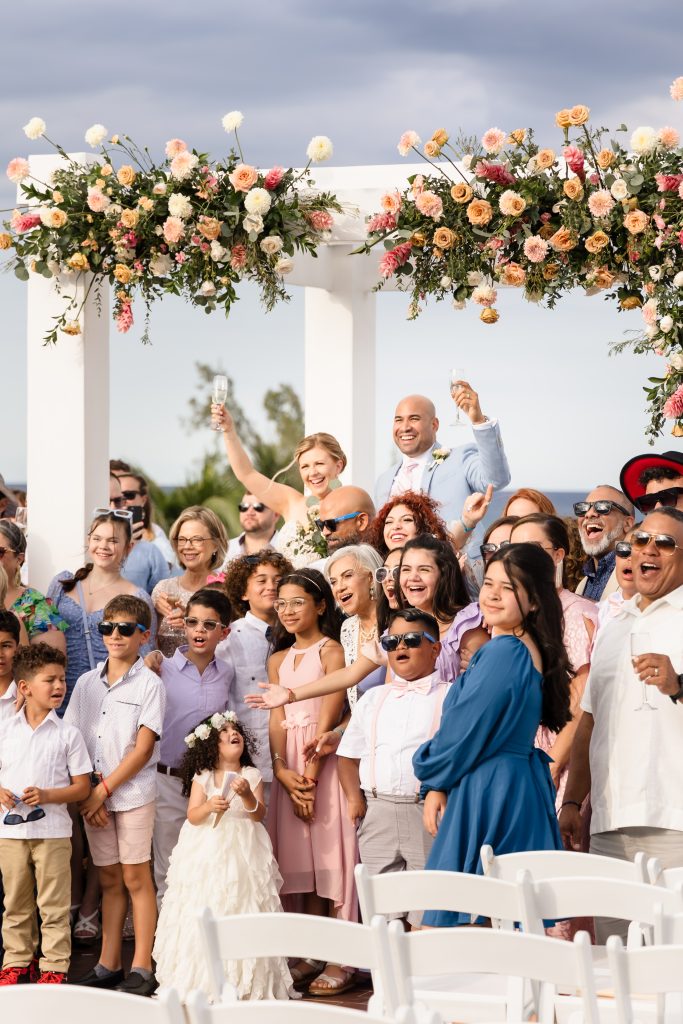 Destination Wedding group photo at The Fives Beach Hotel Riviera Maya Mexico