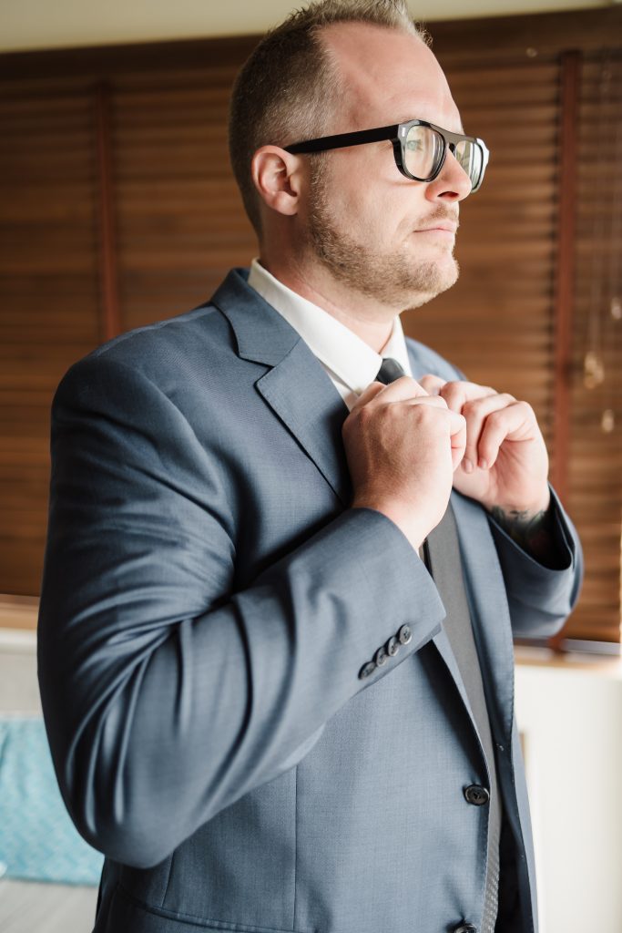 Destination Wedding groom details at hotel Xcaret Arte in Mexico.
