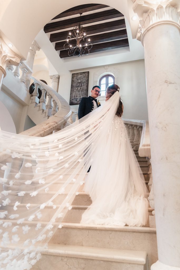 Bride and groom portrait on the stairs at Villa la Joya Destination Wedding Venue in Riviera Maya Mexico